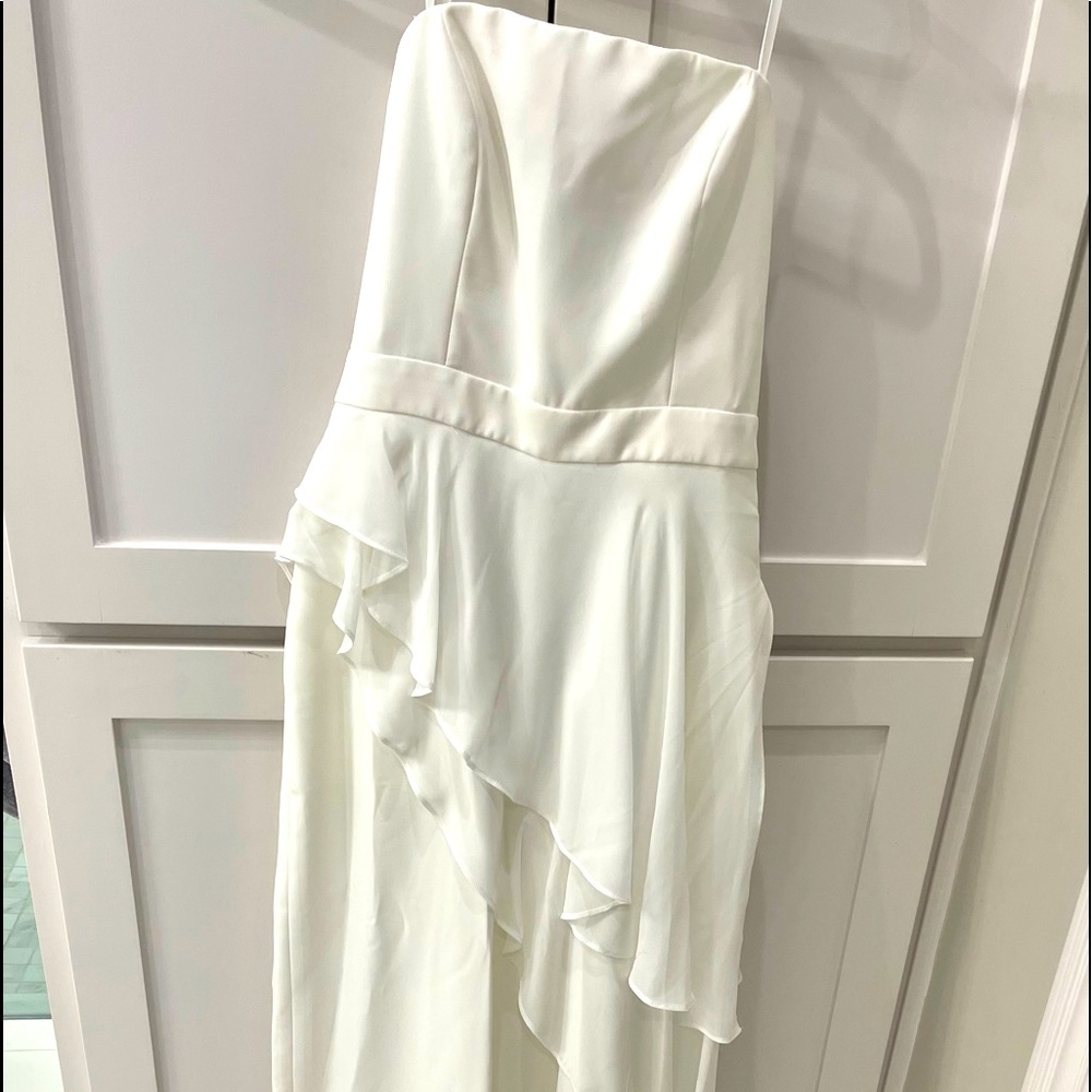 NWT BCBG size 4 white jumpsuit, flowy chiffon overlay